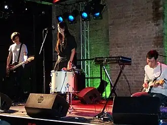 HTRK performing in 2007: Sean Stewart, Jonnine Standish, Nigel Yang