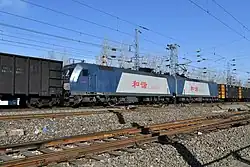 On the Daqin line the HXD1, both double headed and distributed along the train.