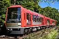 Hakone Tozan Railway Line 3100 series 3-car train approaching Ohiradai Station