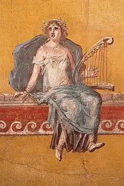 Woman from Pompeii holding harp