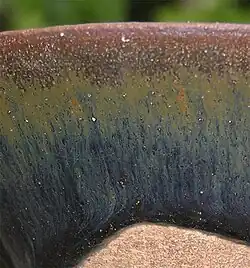 View of the "hare's fur" glazing effect on a Jian bowl