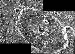 An image of Hay Tau, a crater within Memphis Facula, taken by Galileo in June 1996.