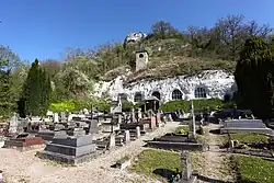 The cave church of Our Lady of the Annunciation and the cemetery of Haute-Isle