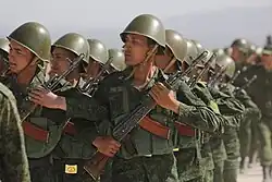 Tajik soldiers with EMR uniforms and old Soviet-era SSh-68 helmets