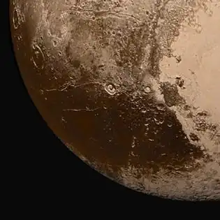 The "head" region of the Belton feature, with Sputnik Planitia at right