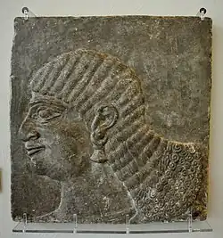 Head of a royal attendant. From the North-West Palace at Nimrud, Iraq. Reign of Ashurnasirpal II, 883–859 BCE