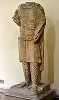 Headless statue of a nobleman.