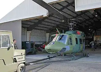 Hangars can hold fixed-wing aircraft, rotary-wing aircraft (helicopters), and lighter-than-air ships.