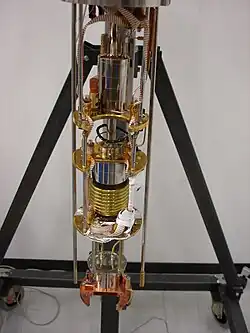 The inside of a wet Oxford Instruments helium dilution refrigerator, with the vacuum cans removed