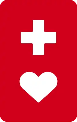 a white heart below a white cross on a red rounded rectangle