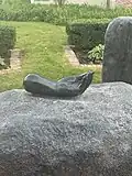 Detail of granite Helping Hands sculpture
