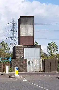 The aboveground Ferry Lane fan shaft building and emergency access point at Heron Island, approximately halfway between Blackhorse Road and Tottenham Hale stations