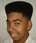 Image 126African-American teenager with Hitop fade, popular in the early 1990s. (from 1990s in fashion)
