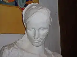 A white death mask of a woman