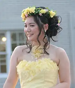 A woman wearing a flower crown at the Himeji Castle festival
