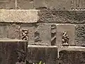 Dancing figures carved on the walls of the Adina Mosque