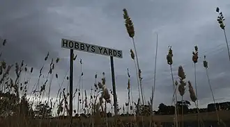 A sign greets visitors to Hobbys Yards