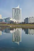 View from the southwest with reflection in the New Danube