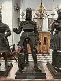A statue of Rudolf I from the Great Ancient Kings Kenotath in Innsbruck (Hofkirche), one of several examples of kasten-brust armour worn by the statues within Maximilian's tomb, this particular example displaying anachronism