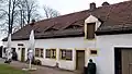 Dormer on the attic of the former farm and stable building