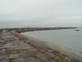 The breakwater seaward from the land end