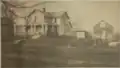Home and barn in photo located to the left of the Dorset School