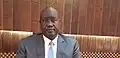 Hon Deng in his office