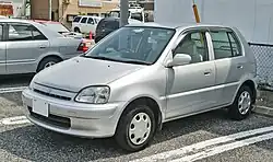 Matching-coloured bumpers, a slightly larger front grille, and a different design of hubcaps to the pre-facelift model