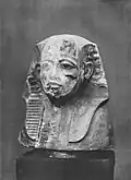 Canopic Jar head of Horemheb found inside his KV57 tomb, wearing the Nemes