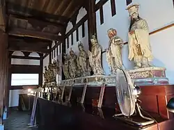 Statues on the right side of the hall