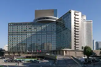 Large modern hotel complex with multiple towers and landscaped grounds