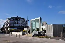 The André Malraux cultural center in the foreground and the Hôtel de Ville at the back
