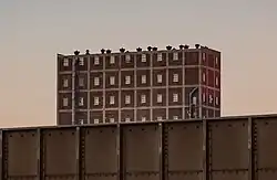 A train in Humboldt Yard passes by the SOO Line terminal elevator.