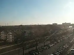 Huntington as seen from the Washington Metro; the lower parking deck of Huntington Station may be seen in the foreground.