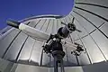 Lens telescope with open dome