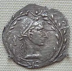 Coin depicting a man wearing a laurel wreath, modelled after the coinage of Augustus