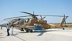 An AH-64A Apache Peten attack helicopter of 190 Squadron "Magic Touch" at an exhibition in 2017