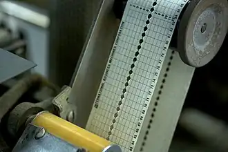 Paper tape loop controlling paper positioning in an IBM 1403 line printer (1959-1983)