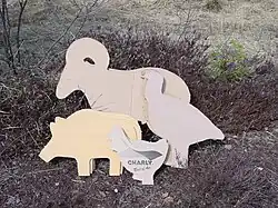 Cut cardboard targets of the same shape and sizes which are used for IHMSA metal targets in metallic silhouette shooting
