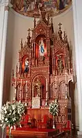 Estácio Zambelli: statue at the main altar of the Church of Our Lady of Lourdes, Caxias do Sul.