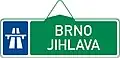VII-1b Route indicator with direction via expressway-ring road (two destinations) (old)