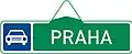 VII-2a Route indicator with direction via road for motor vehicles