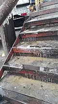 Icicles on stairs as a result of the freezing temperatures. It had rained the day before, 26&nbsp;°F/−3&nbsp;°C, Monterrey, Nuevo León, México.