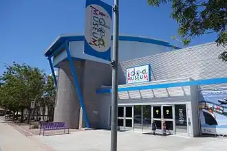 Gray building with blue trim