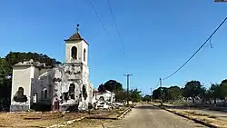 Photo of destroyed Catholic church at a distance