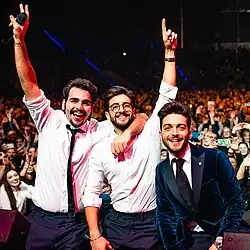 Il Volo during a concert at the Atlas Arena in Łódź, Poland, 2018. L–R: Boschetto, Barone and Ginoble.