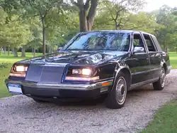 1992 Chrysler Imperial (open headlamp covers)