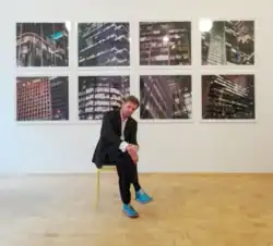 Andreas Schmidt in his gallery, looking very important and expecting Uber-Rich Swiss collectors - Photographed by Mishka Henner
