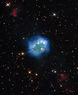 The interaction of two doomed stars has created this spectacular ring adorned with bright clumps of gas — a diamond necklace of cosmic proportions.[8]