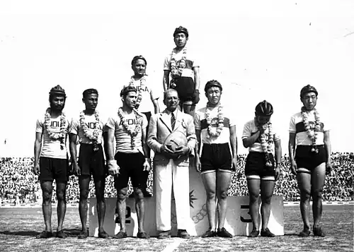 Cyclists in national uniform.